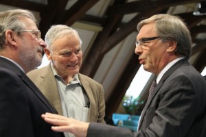 Jeannot Krecke, right, shares a moment with Dr. Lee Hood, center, and Luxembourg Minister of Health, Mars Di Bartolomeo.